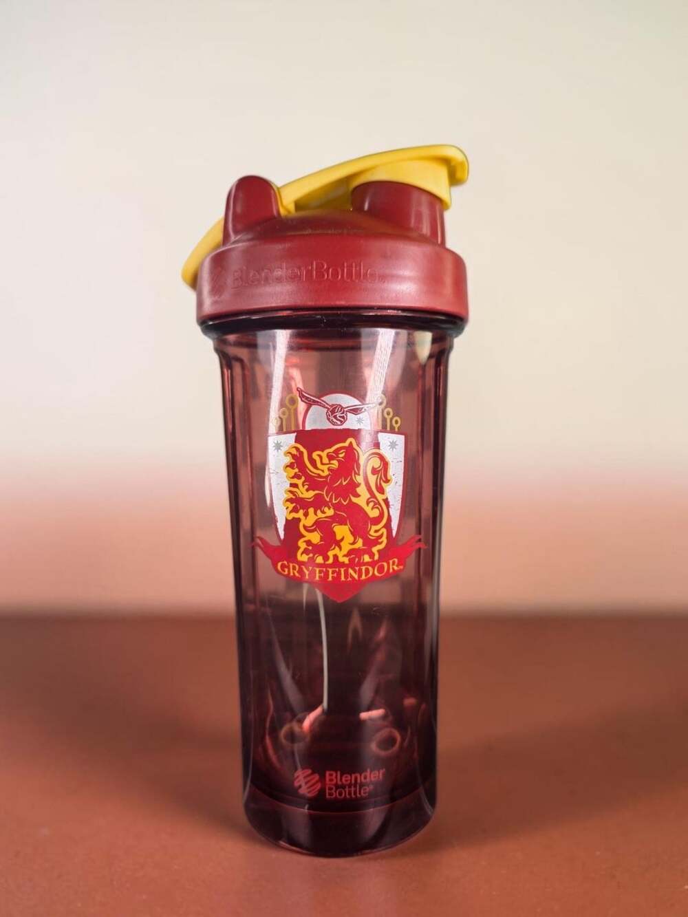 BlenderBottle Pro 28 Oz. Harry Potter Gryffindor Shaker Bottle with Loop Top